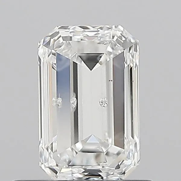 Rectangular cut diamond on a gray background