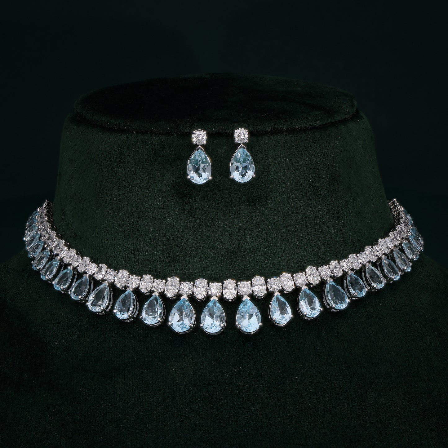 Aqua Elegance Teardrop Choker Set on a green velvet stand