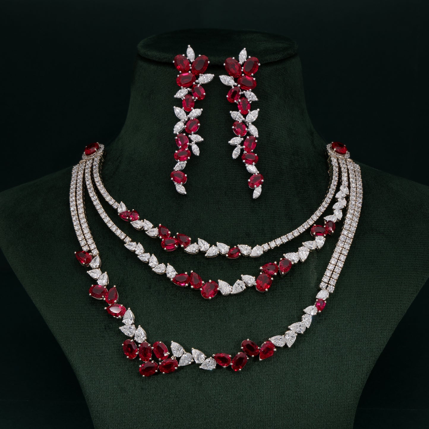 Crimson Cascade Diamond Set on on a green velvet stand