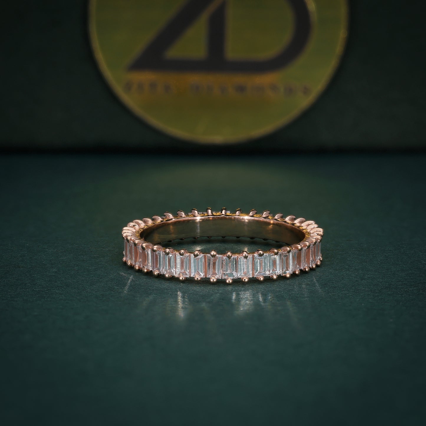 Elegant 18KT Gold Eternity Band with Baguette Diamonds