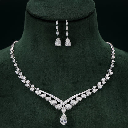 Aurora White Necklace Set on a green velvet stand