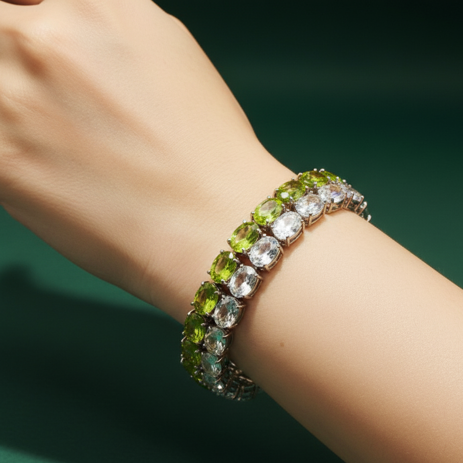 Gold Tennis Bracelet with Oval Cabochon-Cut Peridot Gemstones