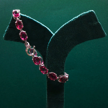 Sterling Silver Tennis Bracelet with Purplish-Red Ruby Cabochons