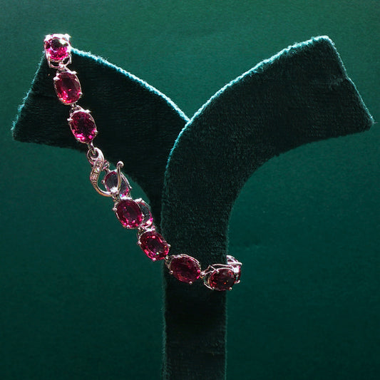 Sterling Silver Tennis Bracelet with Purplish-Red Ruby Cabochons
