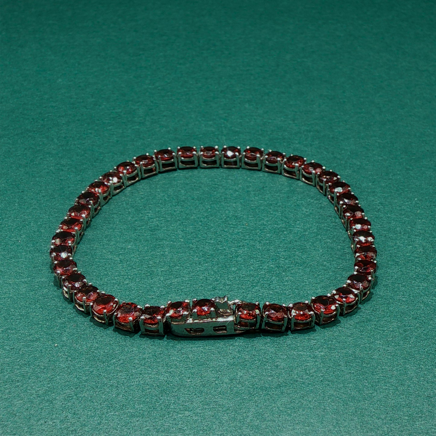 Elegant Garnet Tennis Bracelet with Brilliant Cut Stones