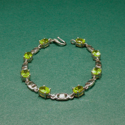 Sterling Silver Chain Bracelet with Oval Cabochon Peridots