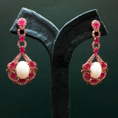 Gold Dangle Earrings with Cabochon Ruby Gemstones