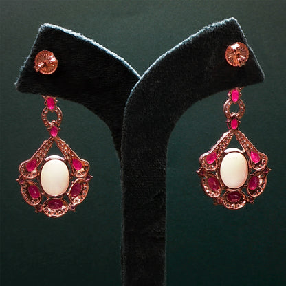 Gold Dangle Earrings with Cabochon Ruby Gemstones