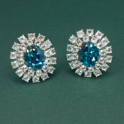 White Gold Stud Earrings with Oval Blue Topaz