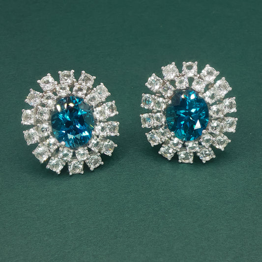 White Gold Stud Earrings with Oval Blue Topaz