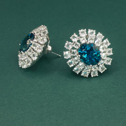 White Gold Stud Earrings with Oval Blue Topaz