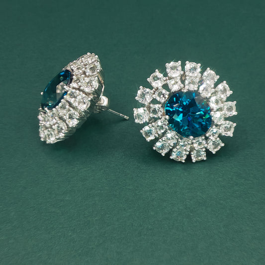 White Gold Stud Earrings with Oval Blue Topaz