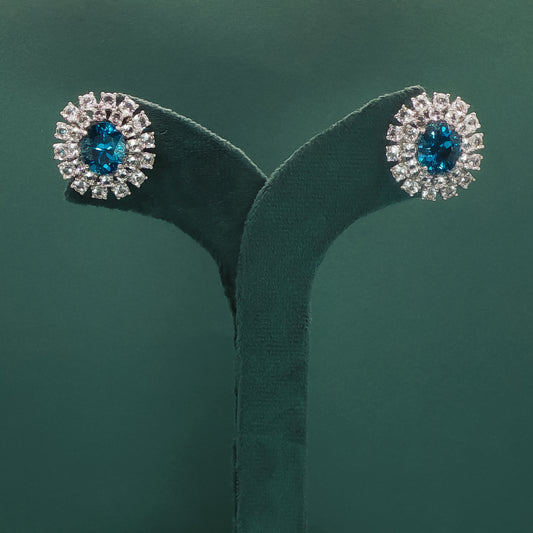 White Gold Stud Earrings with Oval Blue Topaz