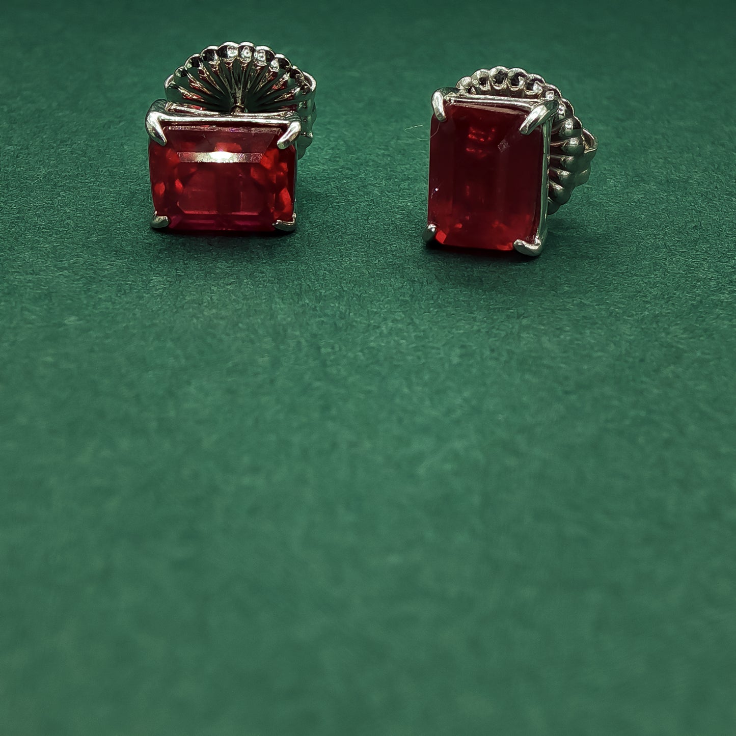 Sterling Silver Stud Earrings with Emerald Cut Red Rubies