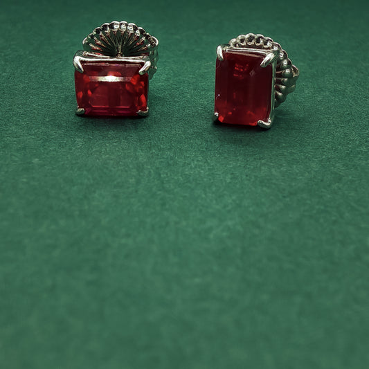 Sterling Silver Stud Earrings with Emerald Cut Red Rubies