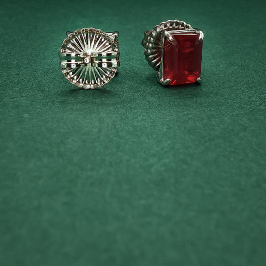 Sterling Silver Stud Earrings with Emerald Cut Red Rubies