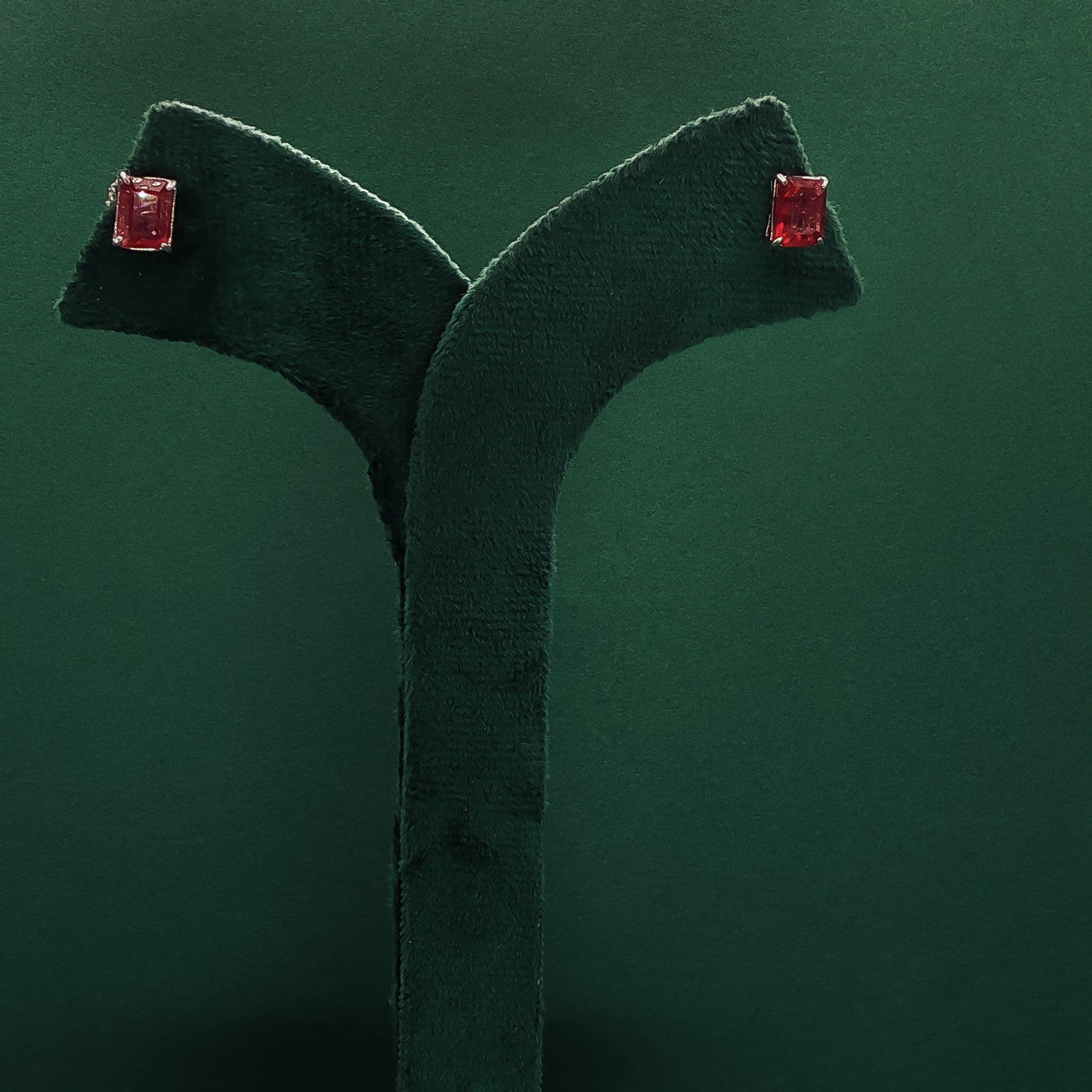 Sterling Silver Stud Earrings with Emerald Cut Red Rubies