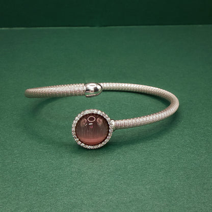 Sterling Silver Bangle Bracelet with Round Rose Quartz Cabochon