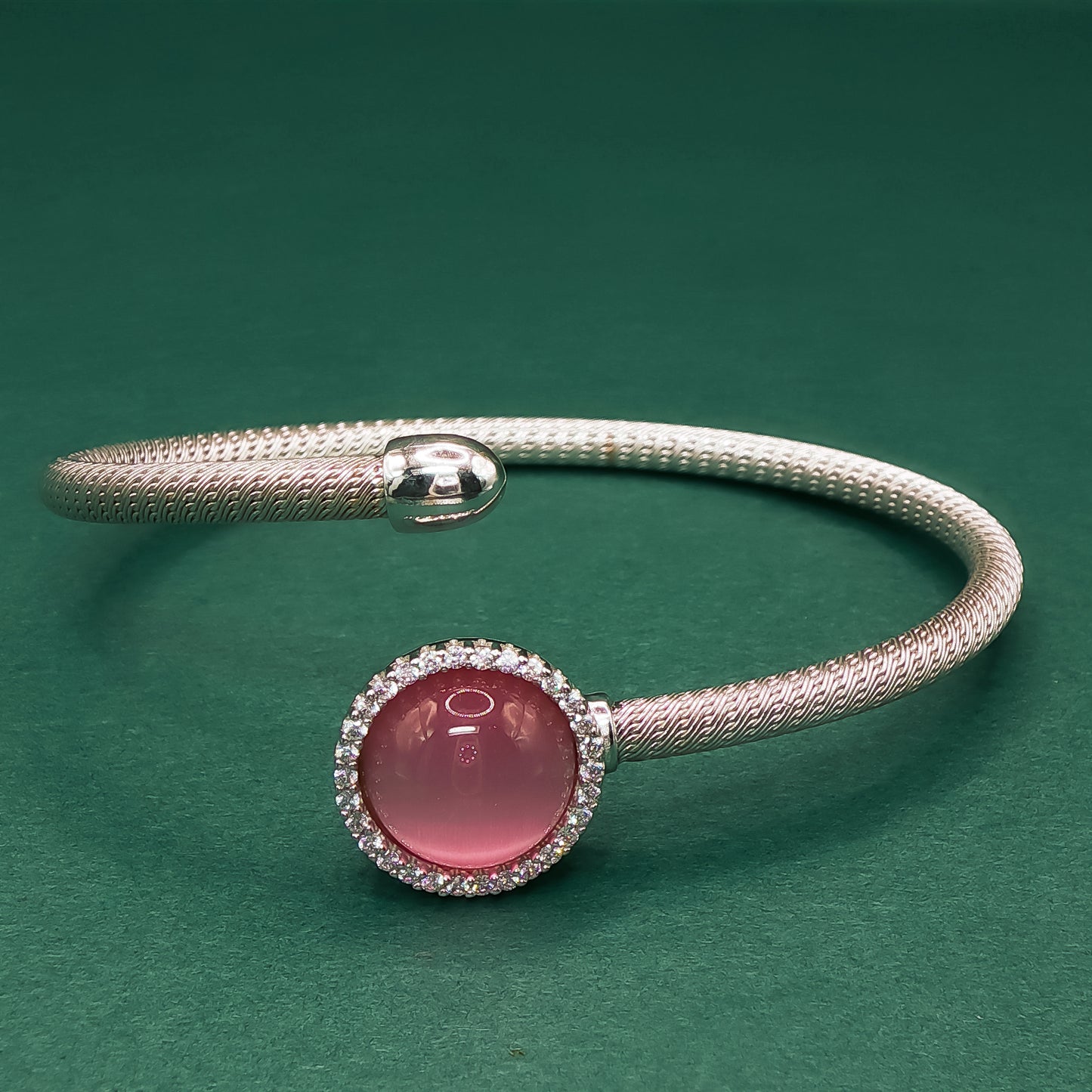 Rose Quartz Set with Elegant Cabochon-cut Reddish-Purple Gemstone