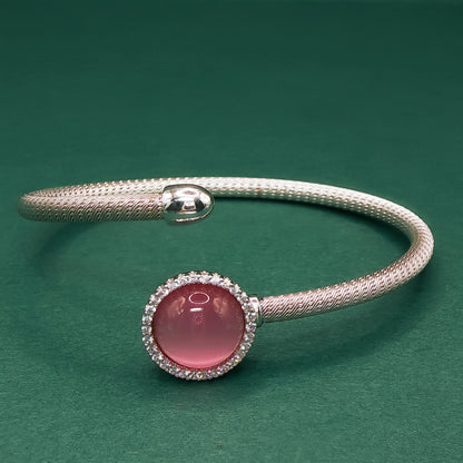 Rose Quartz Set with Elegant Cabochon-cut Reddish-Purple Gemstone