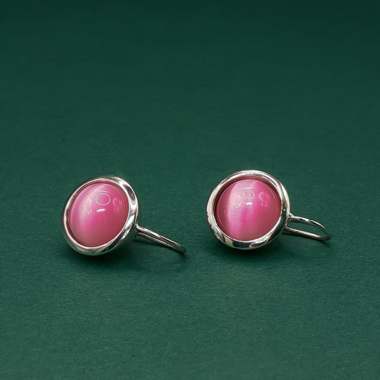 Rose Quartz Set with Elegant Cabochon-cut Reddish-Purple Gemstone