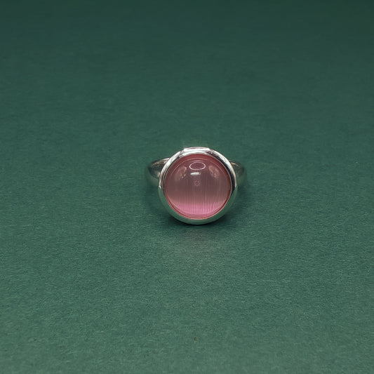 Rose Quartz Set with Elegant Cabochon-cut Reddish-Purple Gemstone