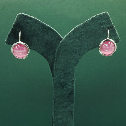 Rose Quartz Set with Elegant Cabochon-cut Reddish-Purple Gemstone