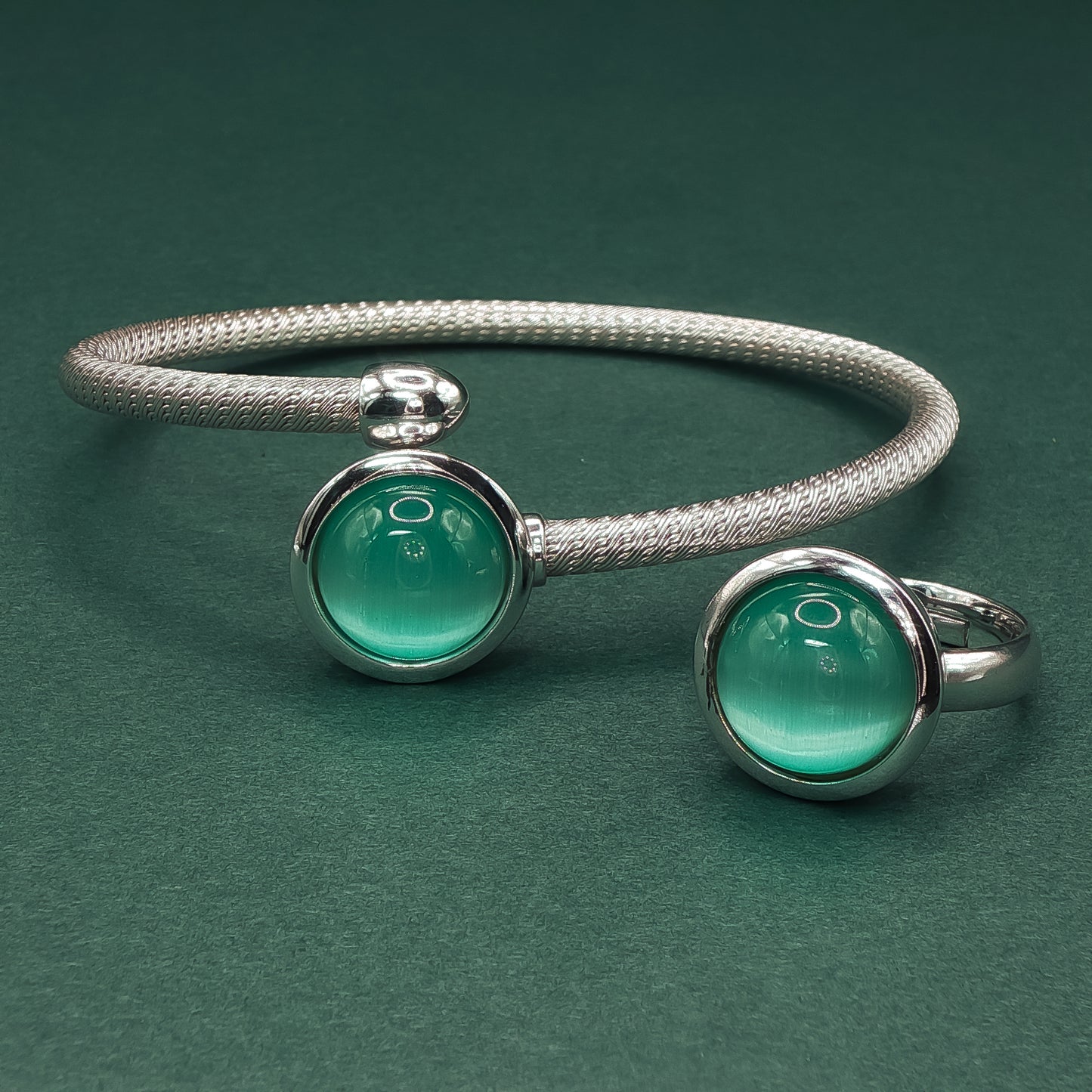 Silver Bangle with Bluish Green Catseye Cabochons