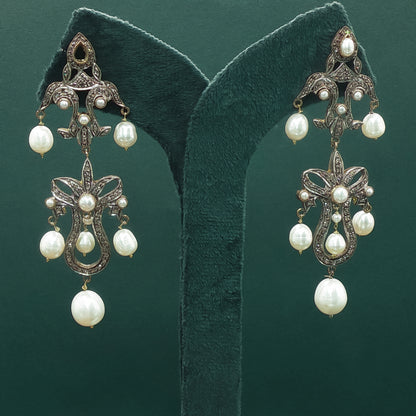 Elegant Silver Dangle Earrings with Pearl Cabochons
