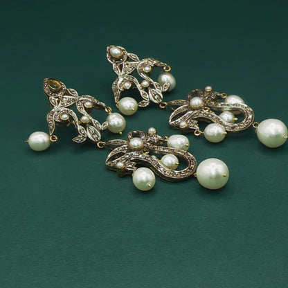 Elegant Silver Dangle Earrings with Pearl Cabochons