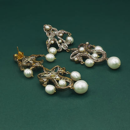 Elegant Silver Dangle Earrings with Pearl Cabochons