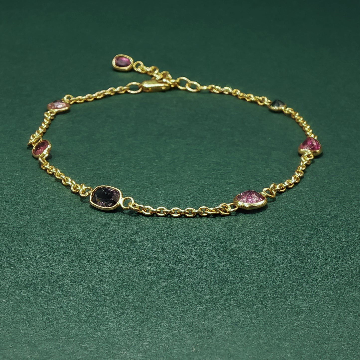 Yellow Gold Chain Bracelet with Reddish-Purple Amethyst Gemstones