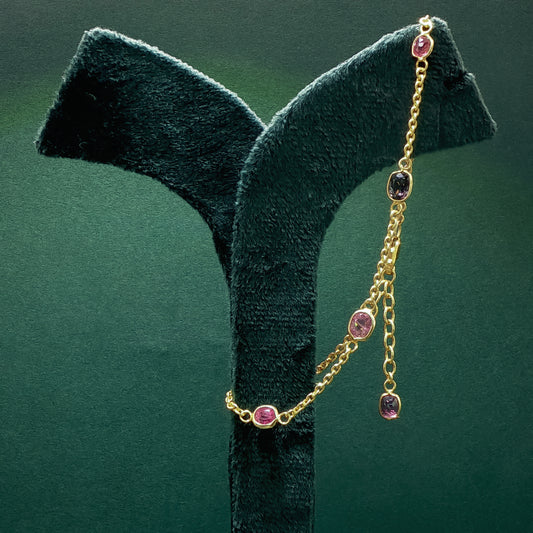 Yellow Gold Chain Bracelet with Reddish-Purple Amethyst Gemstones