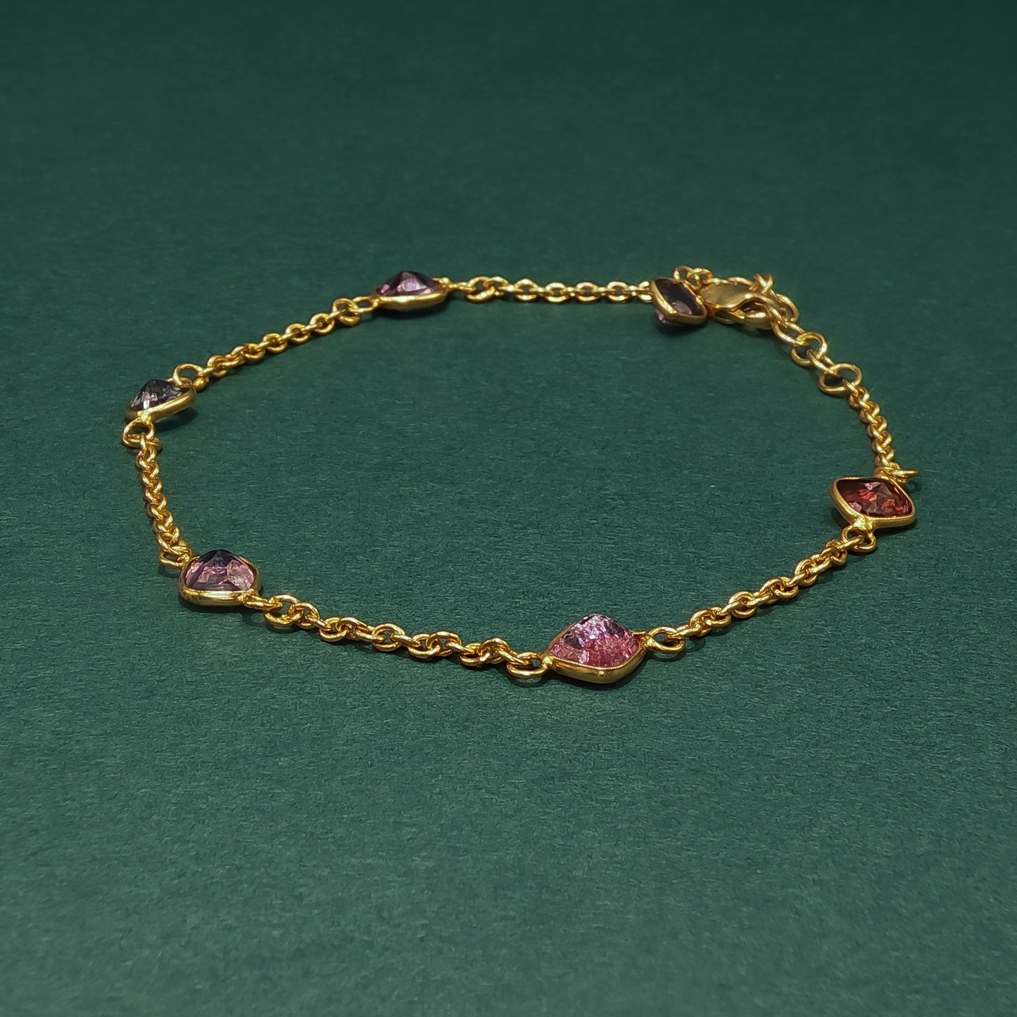 Yellow Gold Chain Bracelet with Reddish-Purple Tourmaline Gemstones