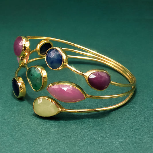 Gold Bangle with Purplish-Red Ruby Cabochons
