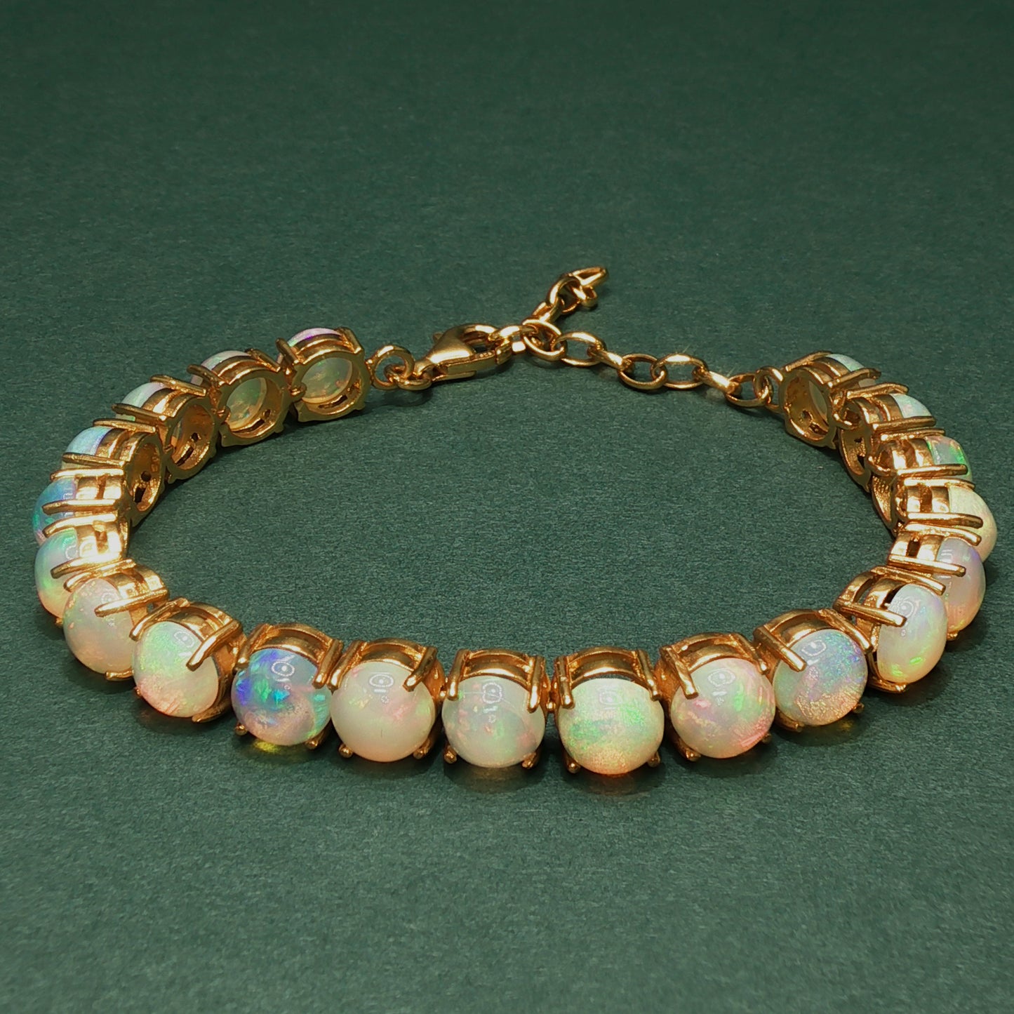 Gold Tennis Bracelet with Round Cabochon Opal Accents