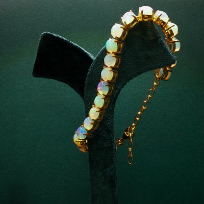 Gold Tennis Bracelet with Round Cabochon Opal Accents