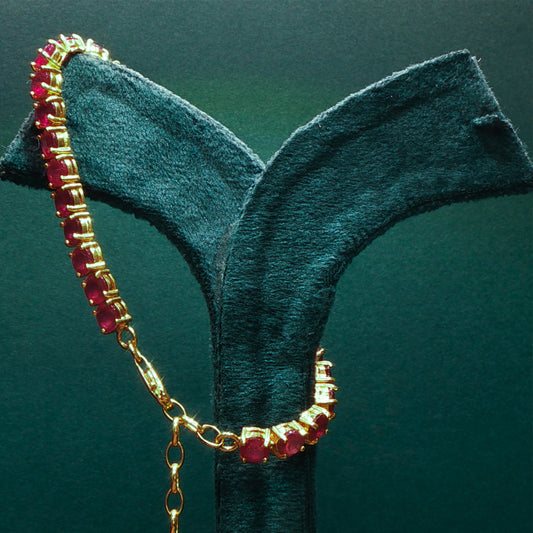 Gold Tennis Bracelet with Cabochon Cut Red Ruby Gemstones