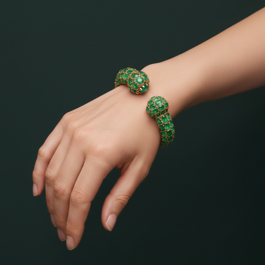 Gold Bangle with Cabochon Emeralds