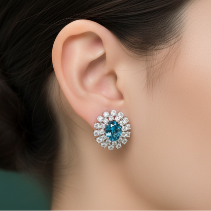 White Gold Stud Earrings with Oval Blue Topaz