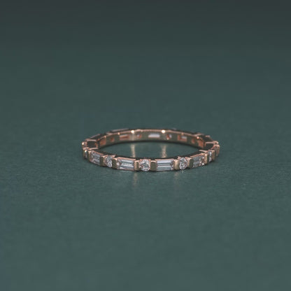 18KT Gold Eternity Band with Baguette and Round Diamonds