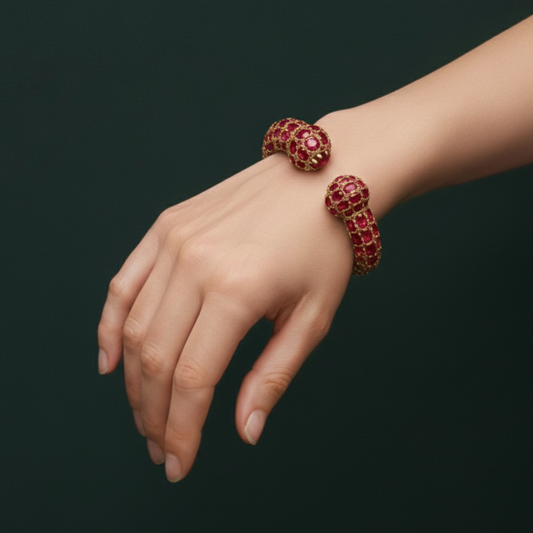 Gold Bangle Featuring Oval Cabochon-Cut Rubies